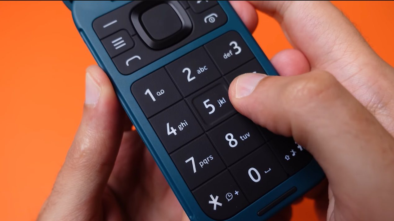 Close-up of a Nokia 2780 Flip phone keypad